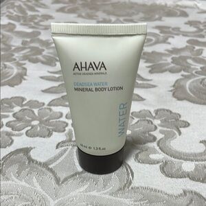 AHAVA White and Black Moisturizer Tube